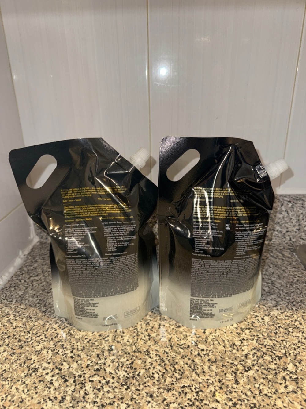 Oribe Gold Lust repair & restorative Duo Refill Pouches in Black and Gold - Picture 2 of 3
